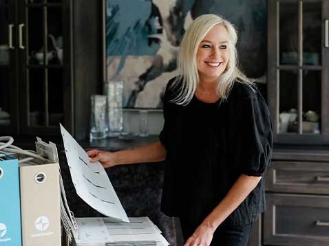 Smiling woman working at a desk